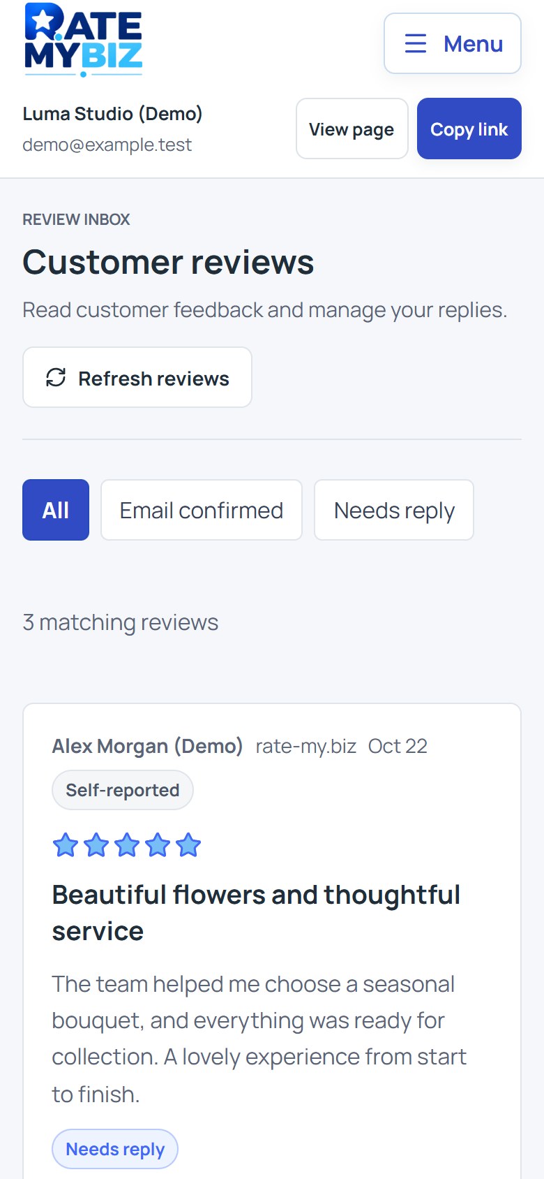 Rate My Biz review inbox with customer feedback and a business reply, mobile view
